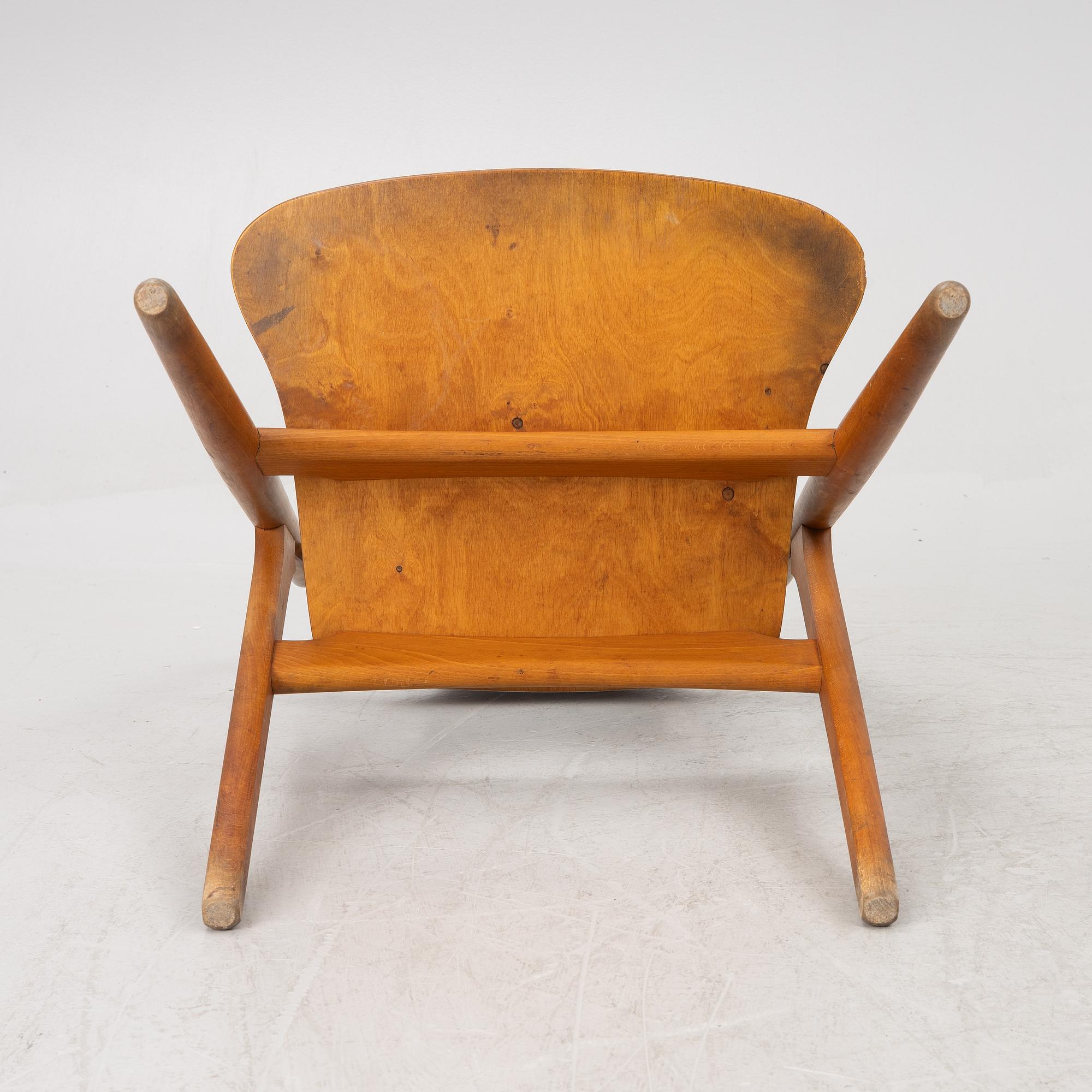 Hans J Wegner, four model CH 29 "The Savbuk Chair", Carl Hansen, 1960s.