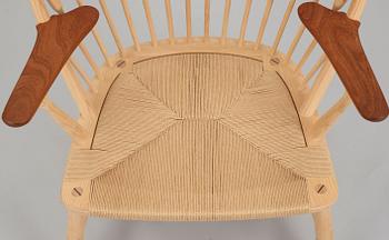 A Hans J Wegner ash and teak 'Peacock chair', by PP Møbler, Denmark.