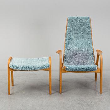 YNGVE EKSTRÖM, a 'Lamino' armchair with a stool, Swedese.