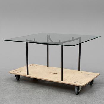 GEORG TOTH, an iron and glass coffee table, signed G. Toth and dated 1998.