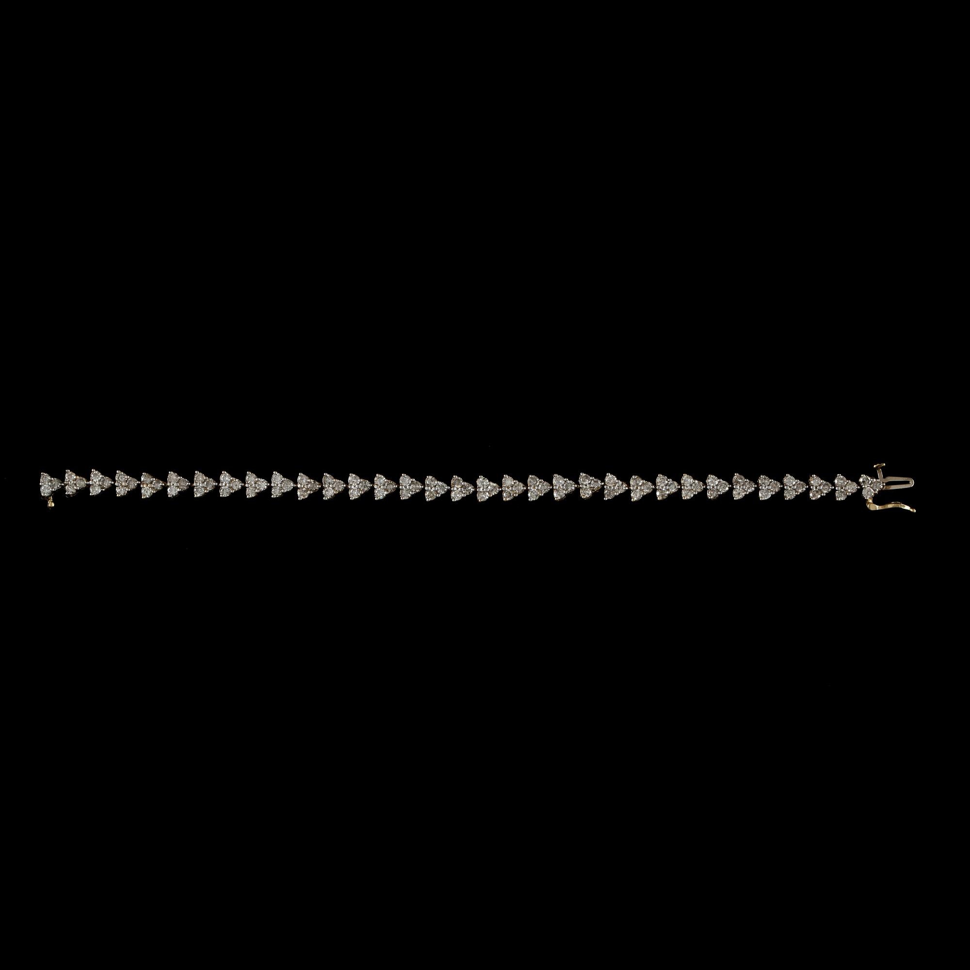 ARMBAND, 14k guld med briljantslipade diamanter tot ca 5 ct. Total vikt ca 13,2 gram.