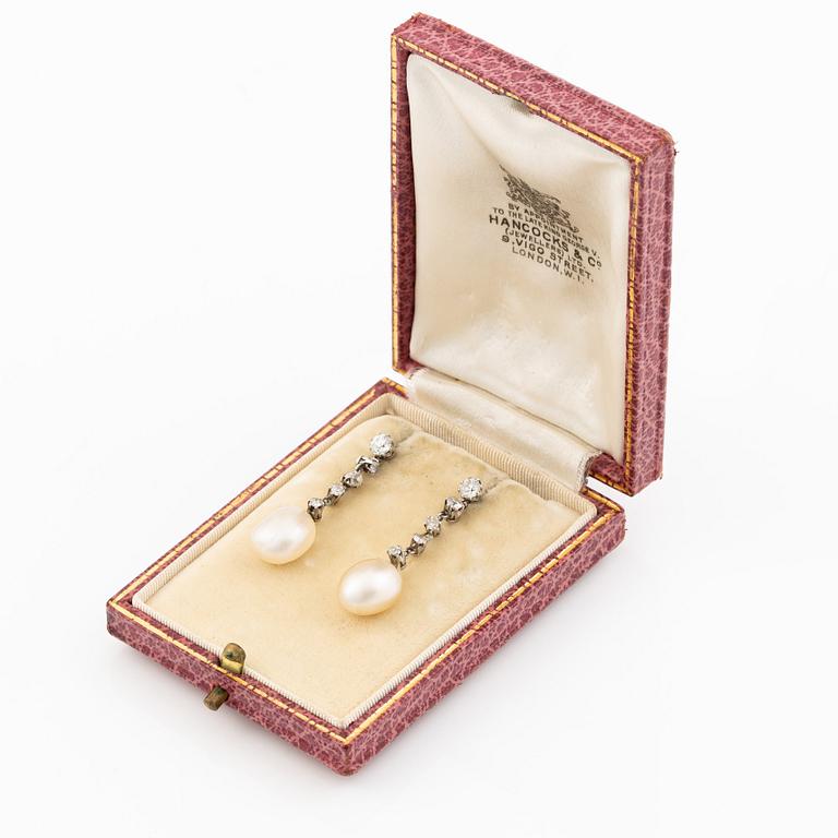 A pair of  earrings in white gold with pearls and old-cut diamonds.