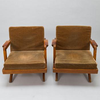 OLAVI HÄNNINEN, A 1960s 'Bumerang' armchairs for HMN Huonekalu Mikko Nupponen, Lahti, Finland.