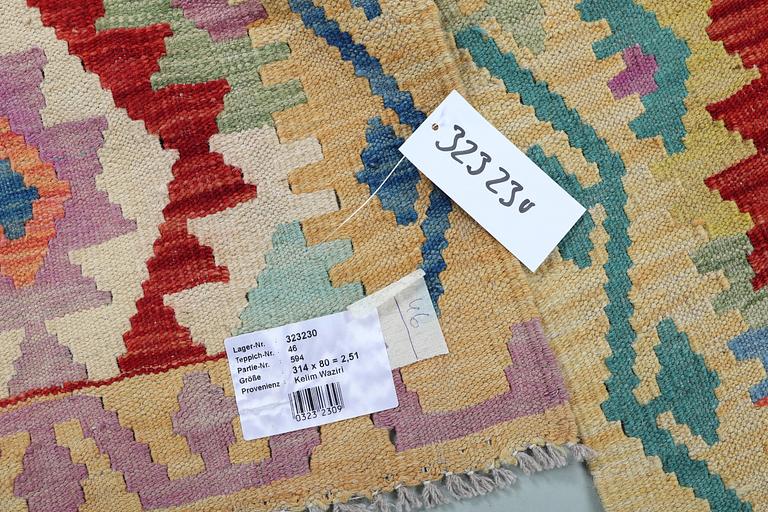 A runner, kilim, ca 314 x 80 cm.