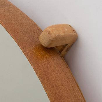 A mirror by Uno & Östen Kristiansson, Luxus, Vittsjö.