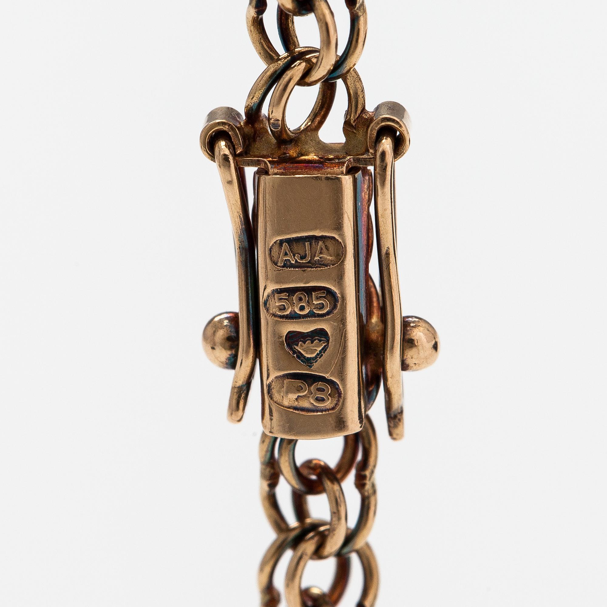 A 14K gold necklace. Aittamäki Ky, Nurmisjärvi 1992.