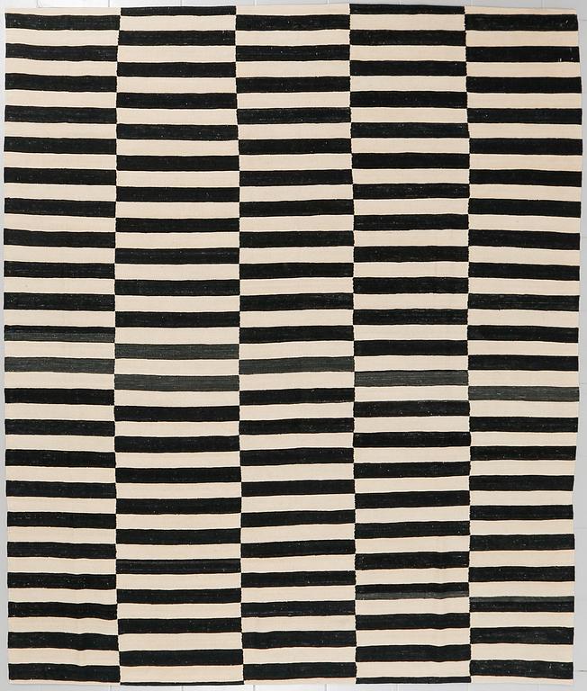 A Kelim carpet, ca 280 x 240 cm.