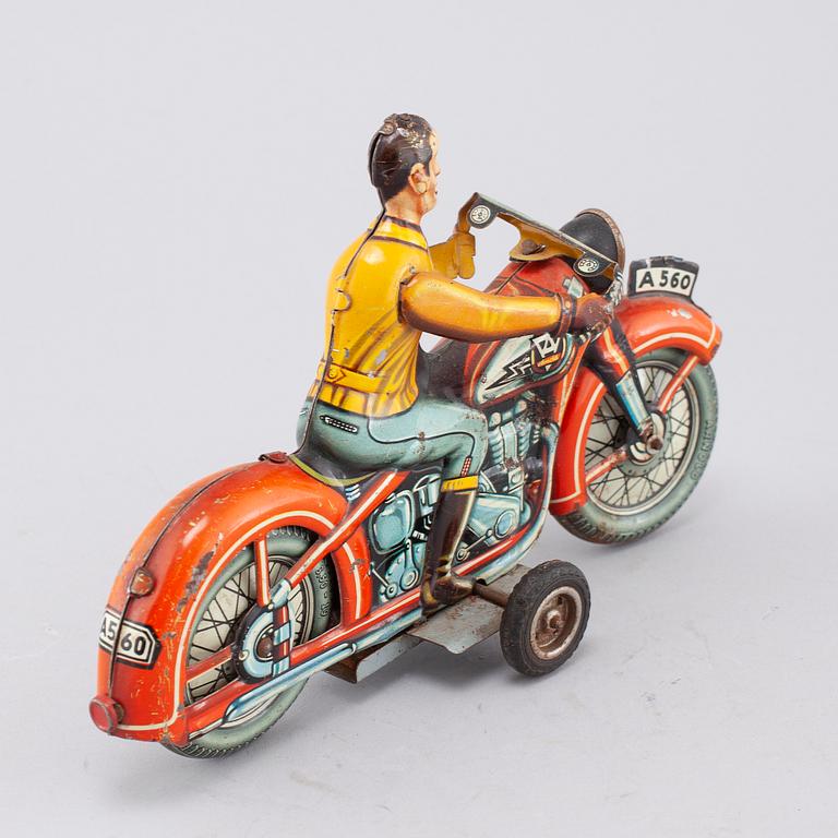 A mid 20th century "Arnold" tin toy.