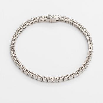 Tennisrannekoru, 18K valkokultaa, briljanttihiottuja timantteja n. 7.00 ct yht.