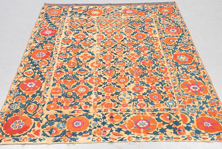 An embroidery, an antique suzani, ca 230 x 169 cm.