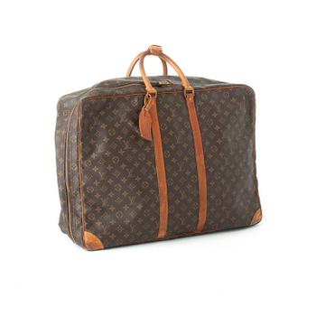 LOUIS VUITTON, a monogram canvas travelling bag "Sirius".