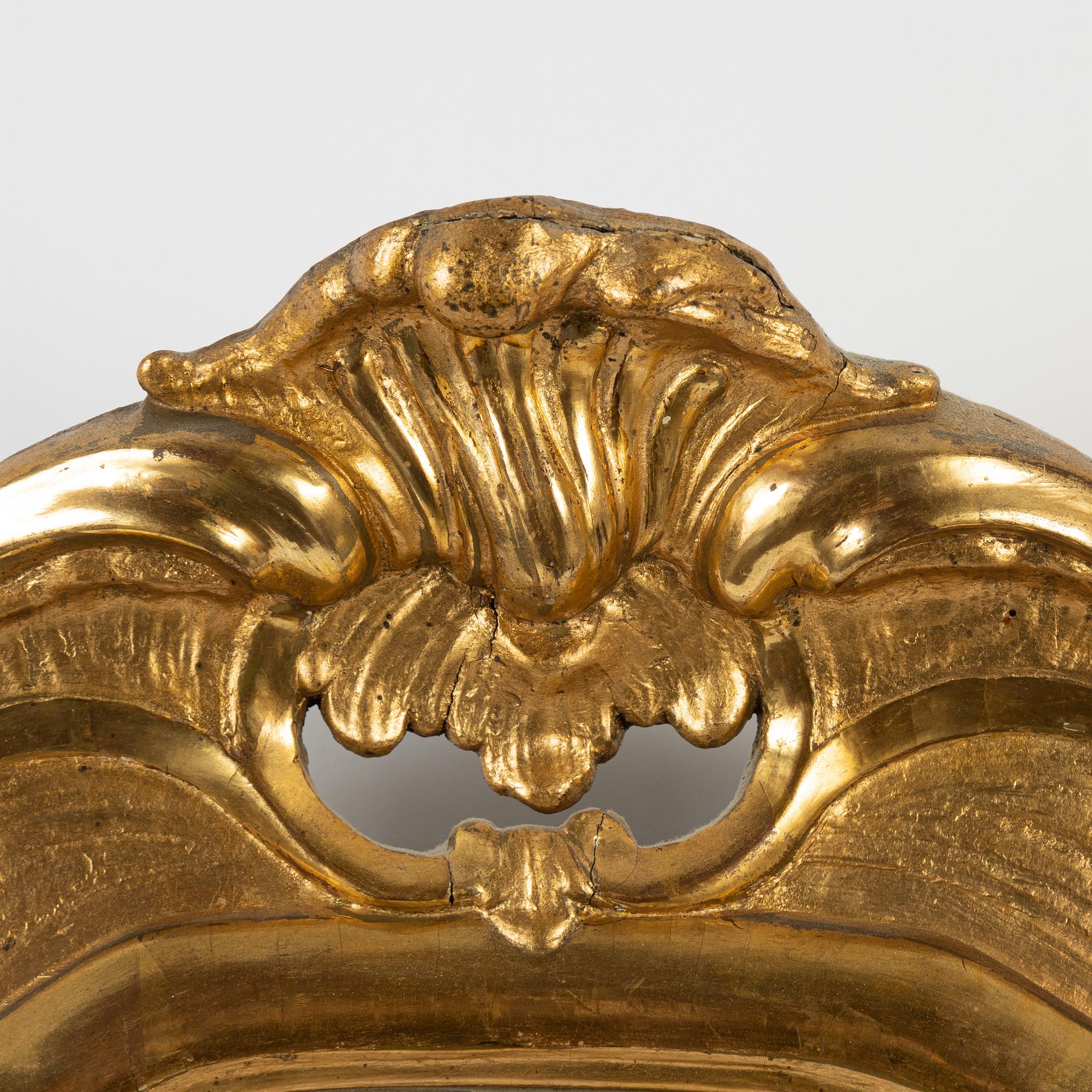 A rococo mirror, mid 18th Century, Stockholm.
