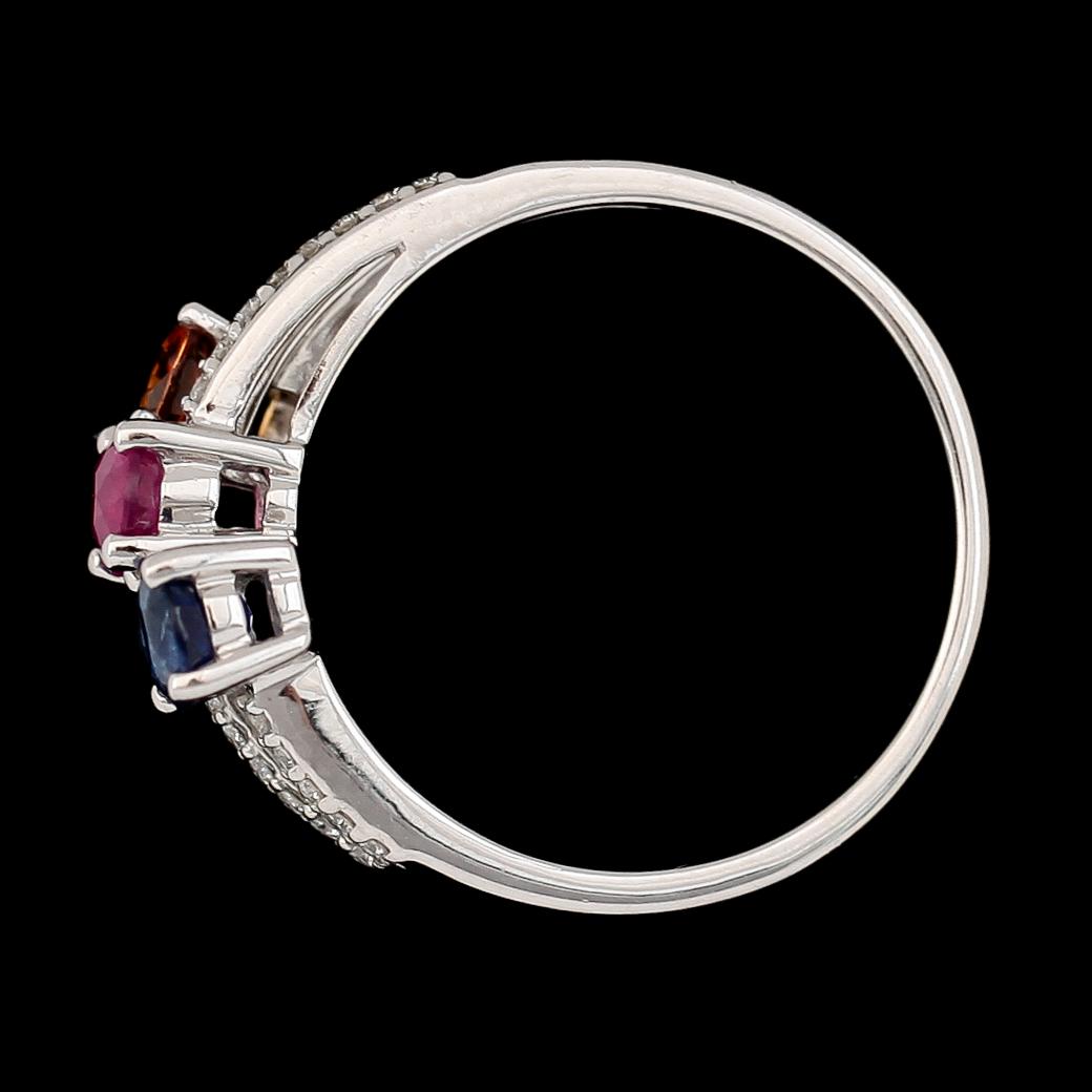 RING, 14K vitguld, rubin, blå och gul safir. Total vikt ca 3 g.