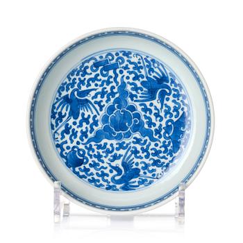 A blue and white heavily potted dish, Republic period with a mark.