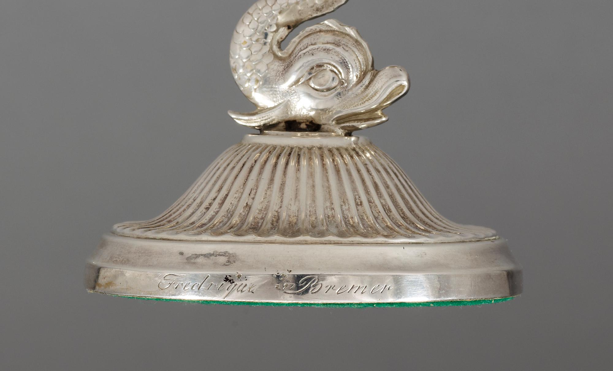 A SWEDISH SILVER WRIGHTING-STAND AND A PAIR OF CANDLESTICKS, Makers mark of Gustaf Möllenborg, Stockholm 1830 and Adolf Zethelius, Stockholm 1812. Provenance: Fredrika Bremer.