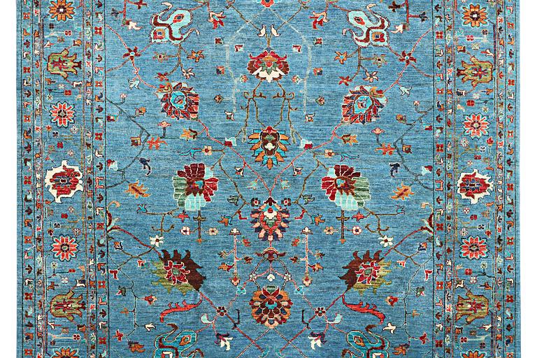 A carpet, Ziegler Ariana, c. 298 x 210 cm.