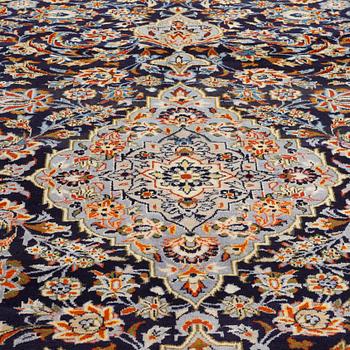A Keshan rug, 363 x 244 cm.