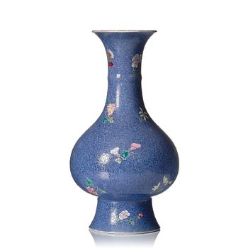 1029. A famille rose sgrafitto vase, Qing dynasty, 19th Century with Qianlong mark.