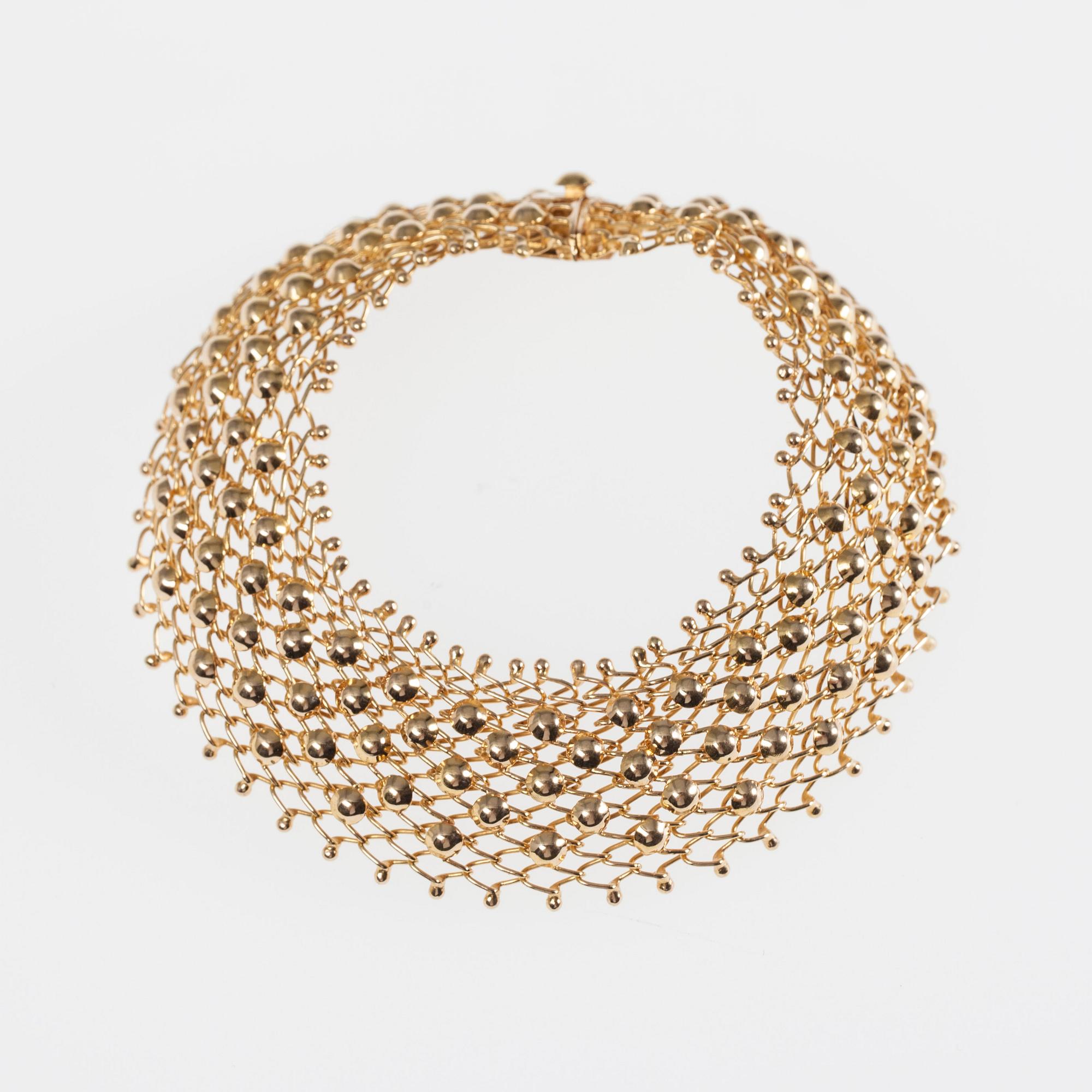 ARMSMYCKE, 18K guld. 1900-talets senare hälft. Vikt 19,3 g.