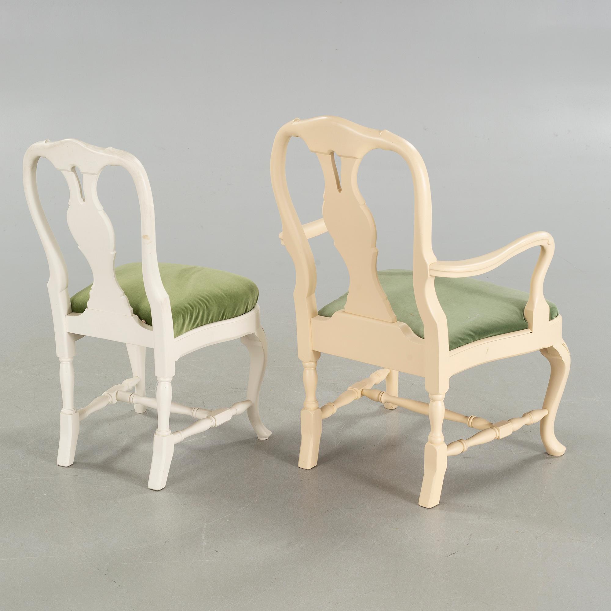 A rococo style table and twelve similar chairs, around the mid 20th century.