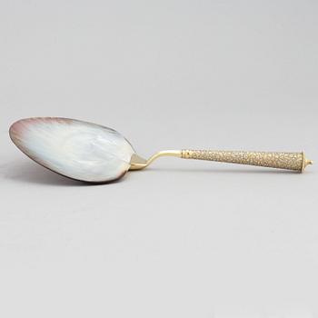 A silver and mother of pearl serving spoon, P. Hertz, Copenhagen, Denmark, 1885.