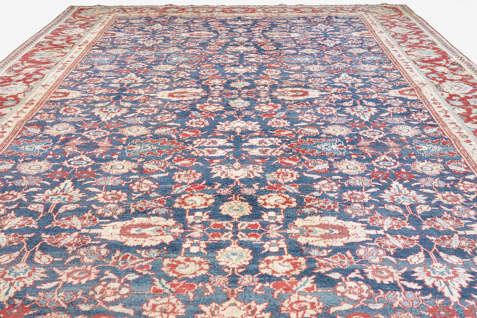 An antique cotton Agra of 'Ziegler Mahal' design, Northern India, c. 647 x 330 cm.