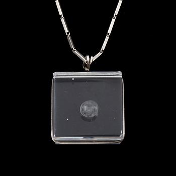 A glass pendant designed by Gunnar Cyrén and a silver necklace.