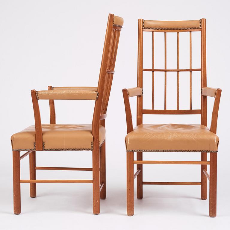 Josef Frank, a pair of mid-Century mahogany chairs, Svenskt Tenn Sweden, model nr 652.