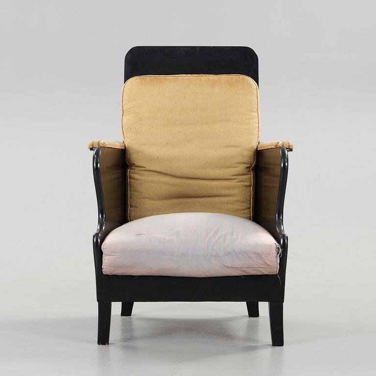 Carl Bergsten, a black lacquered armchair, Nordiska Kompaniet, Sweden ca 1918.