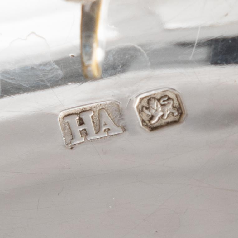 An English silver teapot, mark of Atkin Brothers, Sheffield 1895.