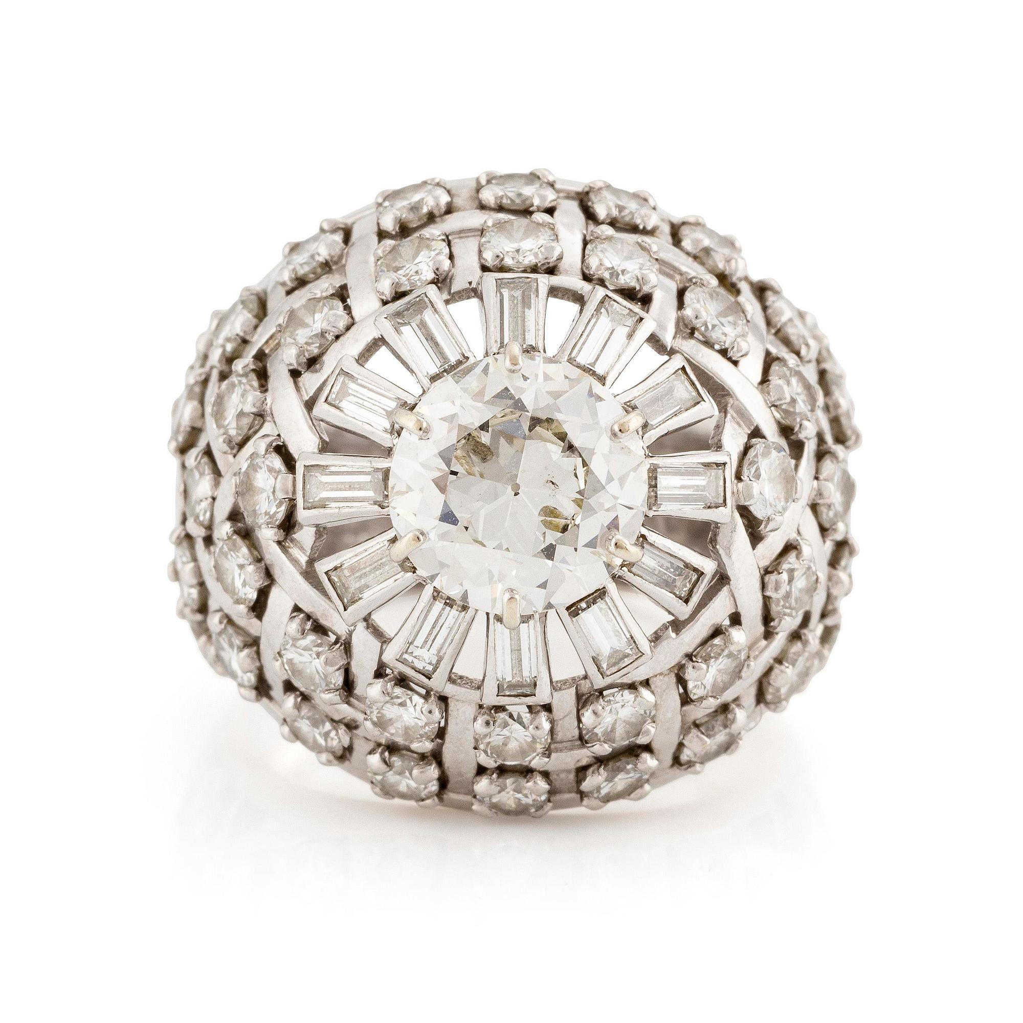 A platinum ring with an old-cut diamond ca 1.90 cts ca I/J i.
