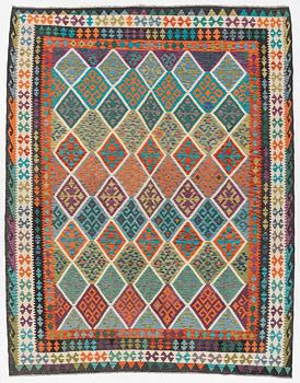 A kilim carpet, c. 344 x 271 cm.
