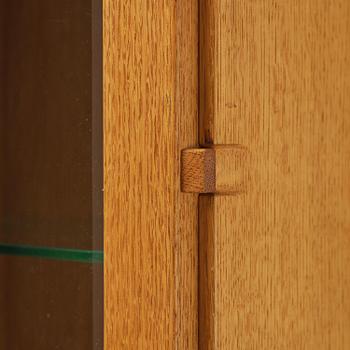 James Krenov, an oak or doussie showcase wall cabinet, executed in his own workshop, Bromma, Sweden.