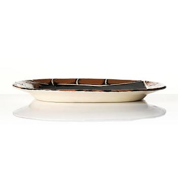Pablo Picasso, a "Colombe mate" (A.R. 77) faience dish, Madoura, Vallauris, France, post 1948.