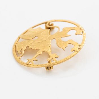 Brosch 18K guld.