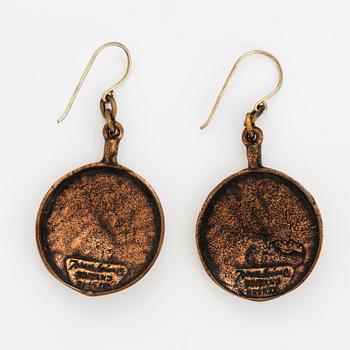 A pair of Jorma Laine earrings in bronze.