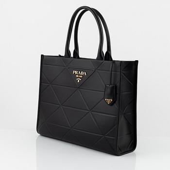 Prada, a black leather bag.
