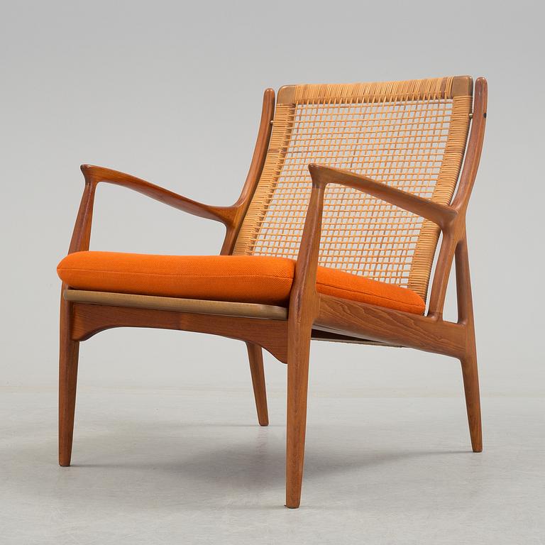 S A ANDERSEN, ERIK ANDERSEN & PALLE PEDERSEN, a teak and rattan easy chair from Horsnaes, Horsens, Denmark, 1960's.