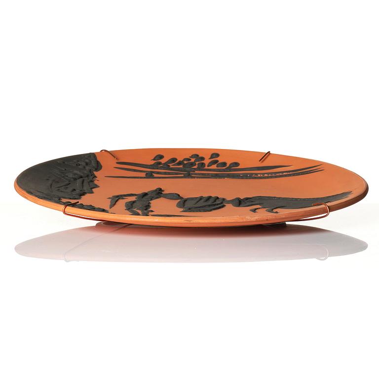 Pablo Picasso, a "Pase de muleta" (A.R. 428) faience dish, Madoura, Vallauris, France, post 1959.