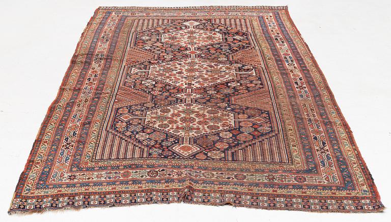 An antique Khamseh carpet, South western Iran, c 352 x 178 cm.