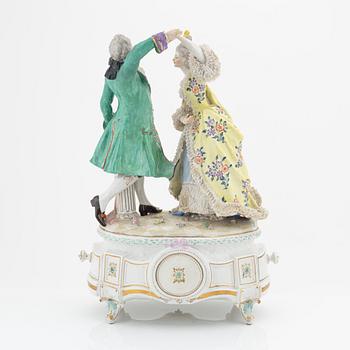 A rococo style porcelain figurine from the early 20th century.