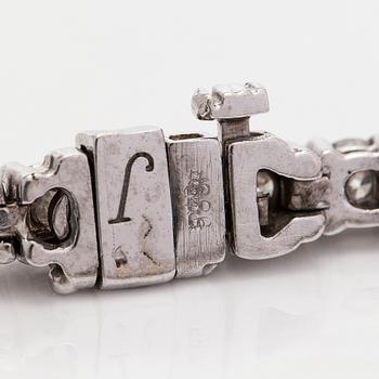 Tennisarmband, 14K vitguld och briljantslipade diamanter.