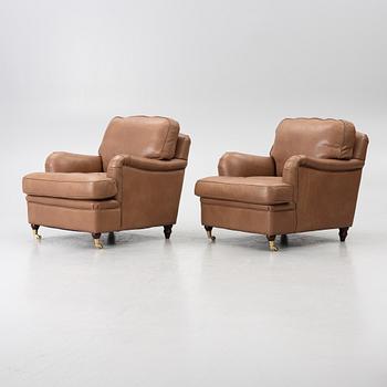 A pair of armchairs, Howard model, IPD, Italy.