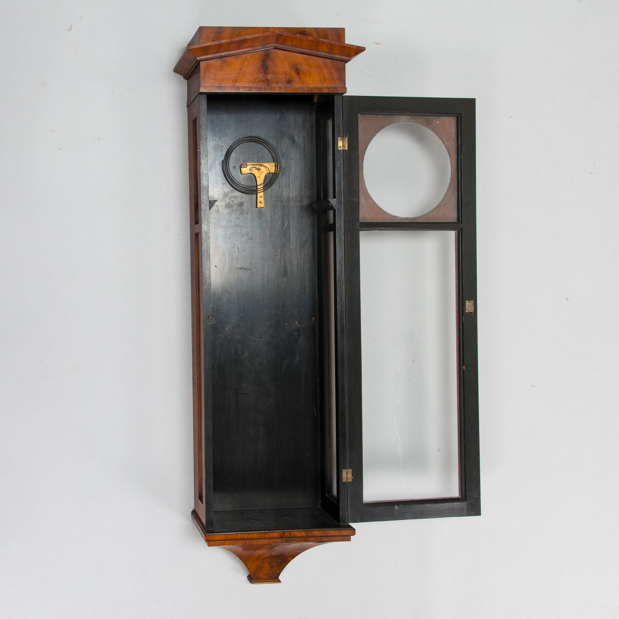A mid 19th Century Biedermeier wall clock.