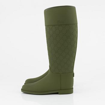 Gucci, a pair of green rubber boots, Italian size 37.