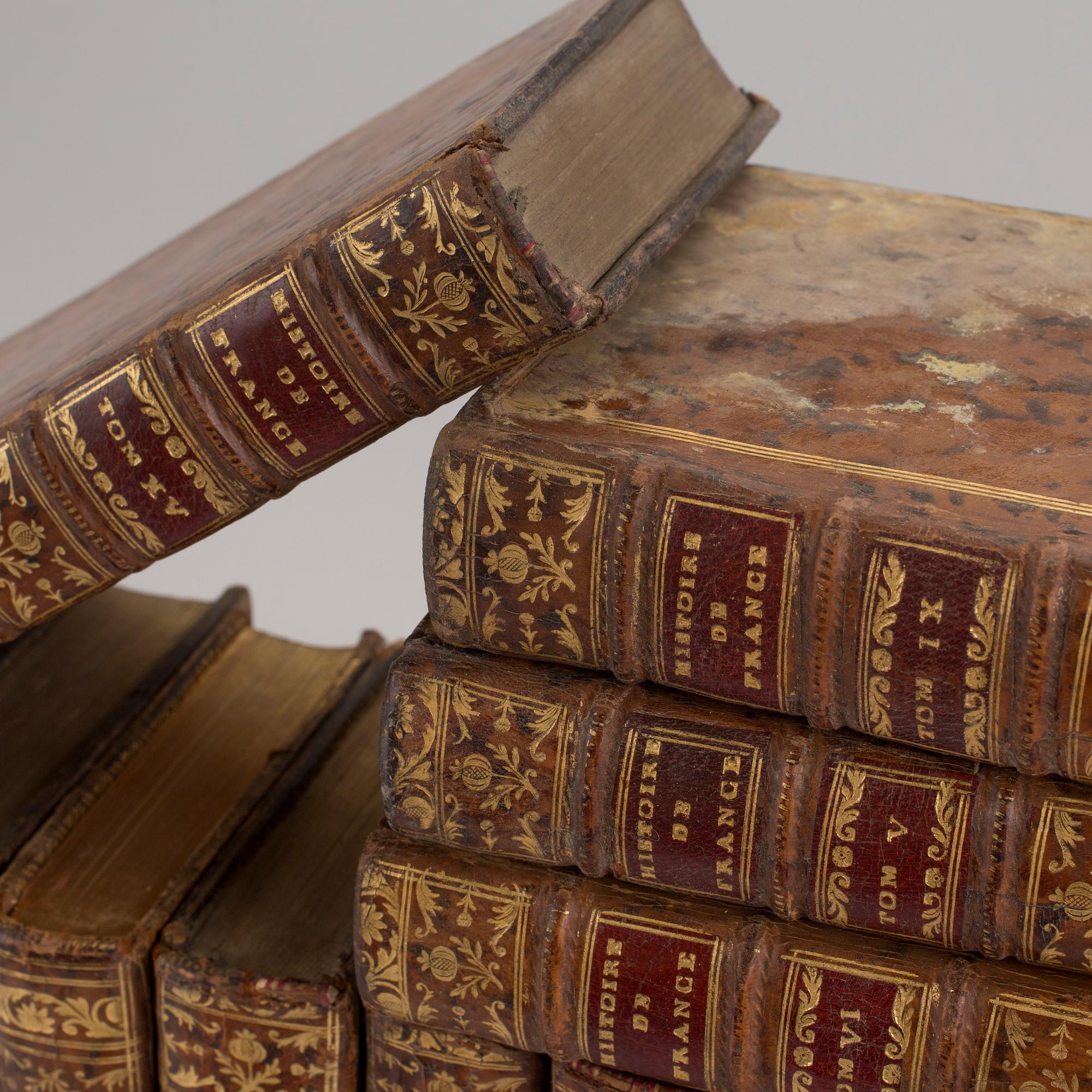A set of 17 1700s books.