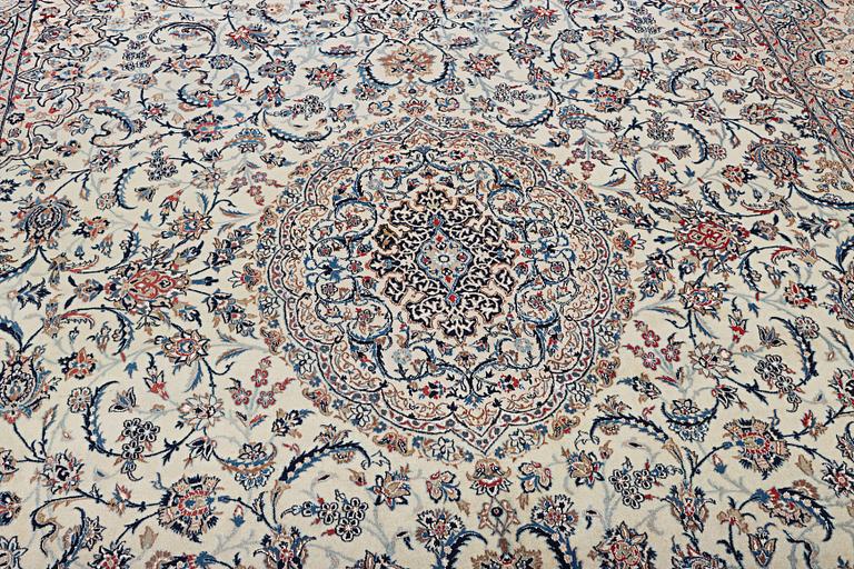 A Nain carpet, part silk, 6 laa, c. 453 x 298 cm.