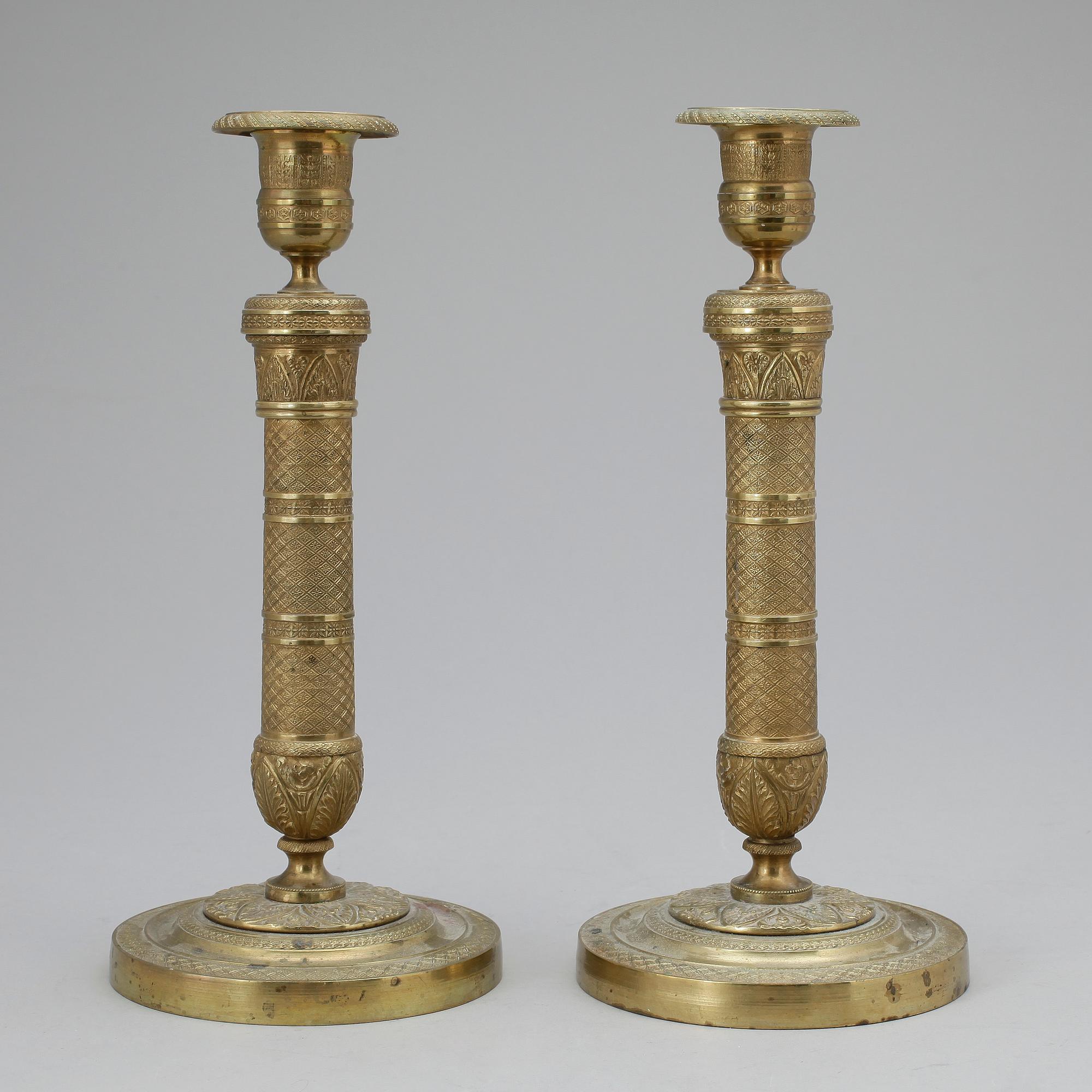 LJUSSTAKAR, ett par, brons. Empirestil 1800-tal.