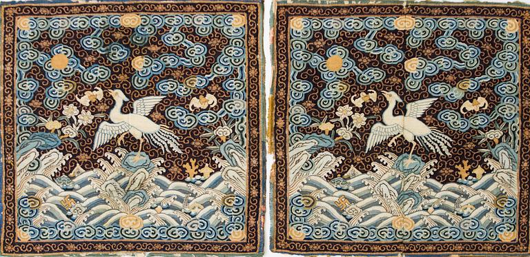 A pair of kesi official's rank badges with silver pheasants, Qing dynasty, early 19th century.