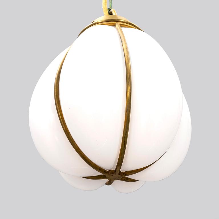 A contemporary 'Hobo' brass and glass pendant lamp by Gustaf Nordenskiöld for Örsjö.